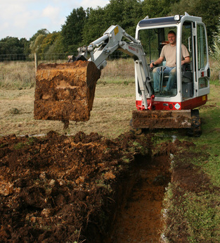 Digging drainage ditches for a local allotment